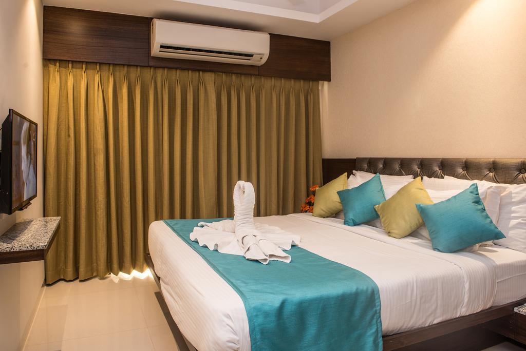 Calangute Towers - Am Hotel Kollection Rum bild